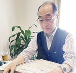 資料を手に説明する八木下会長