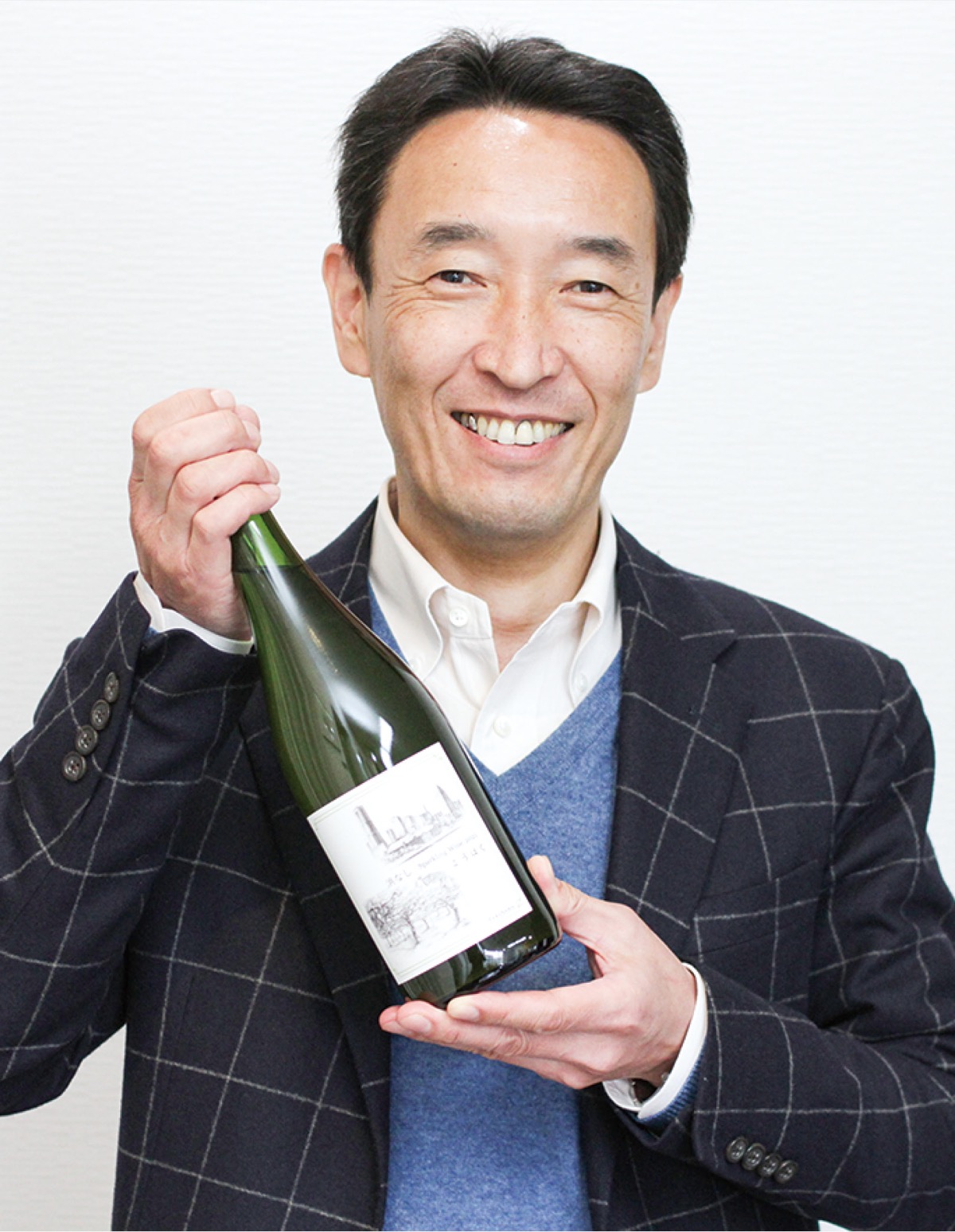 商品を持つ高橋取締役