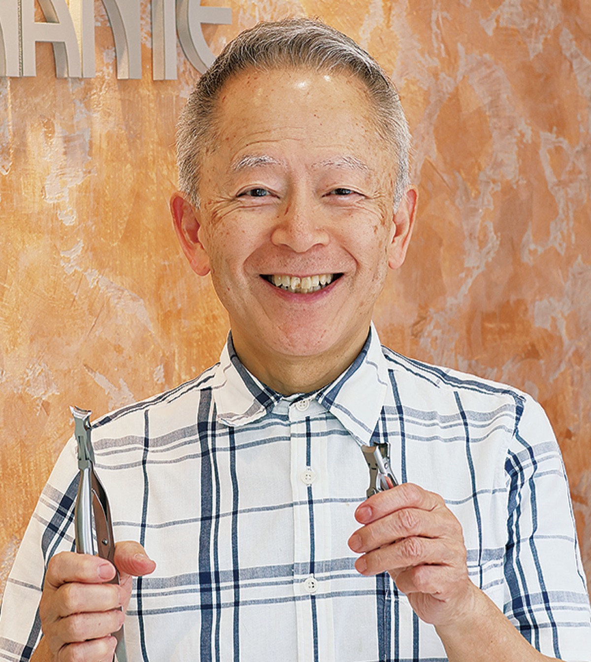 「安全爪切り」を考案