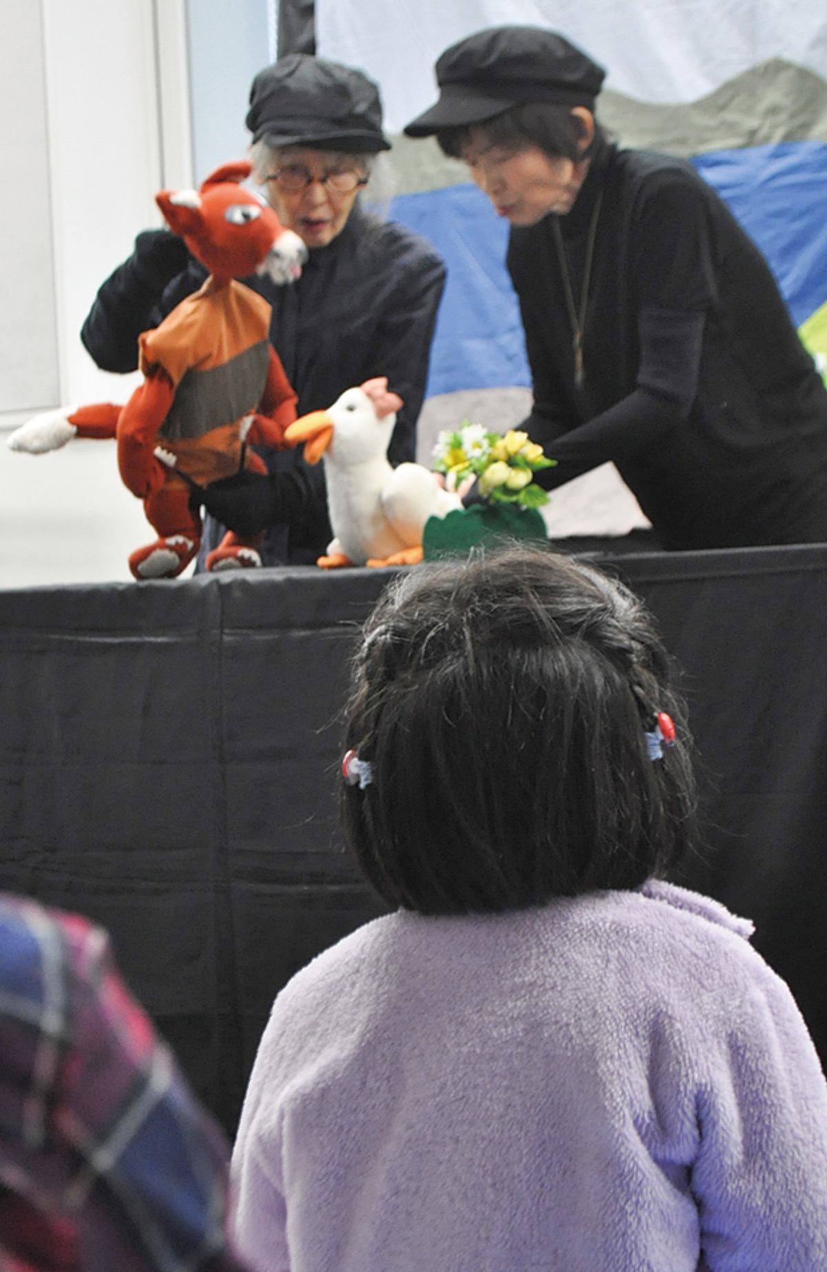 雨の中、イベント盛況