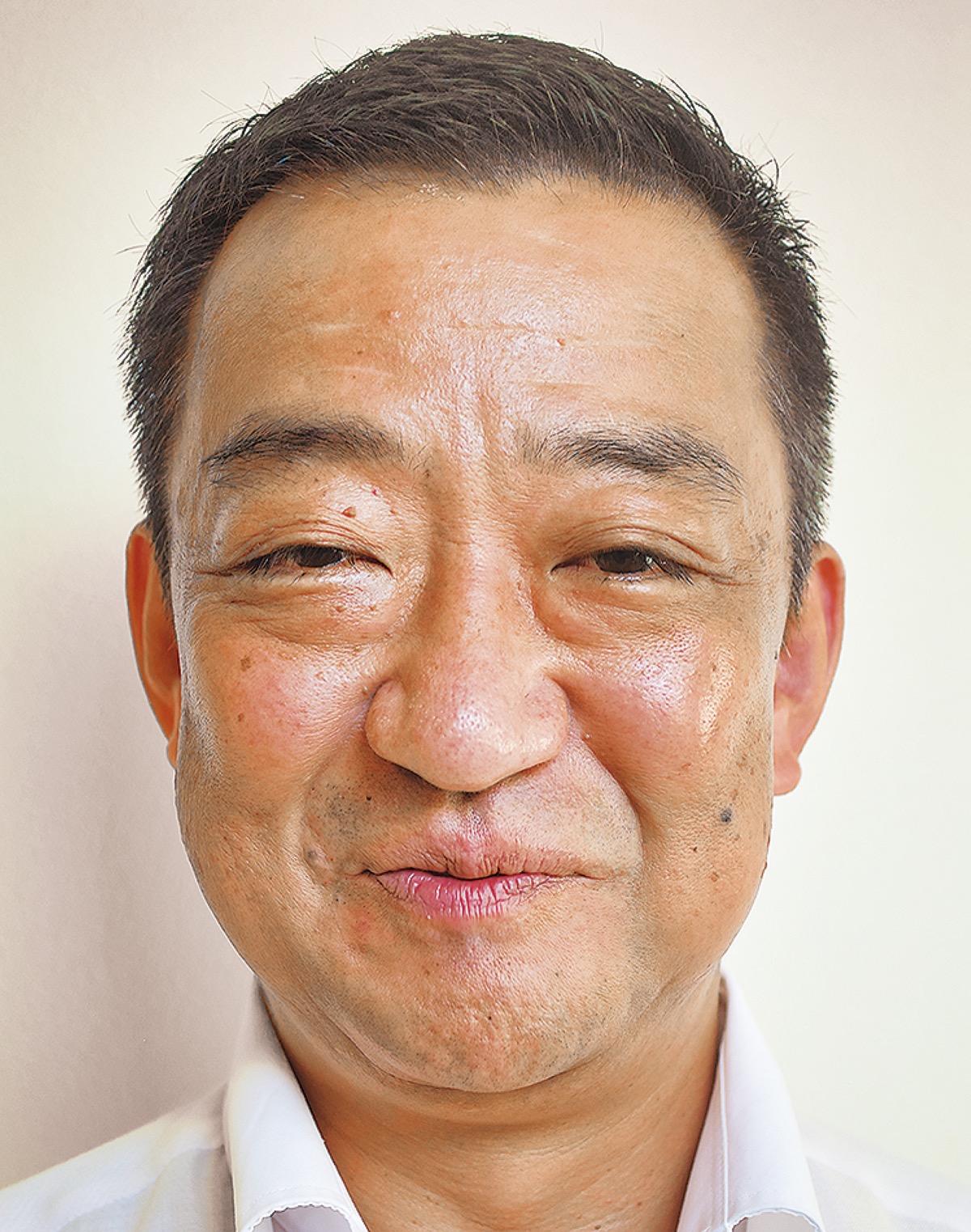 榊原 英治さん (写真1)