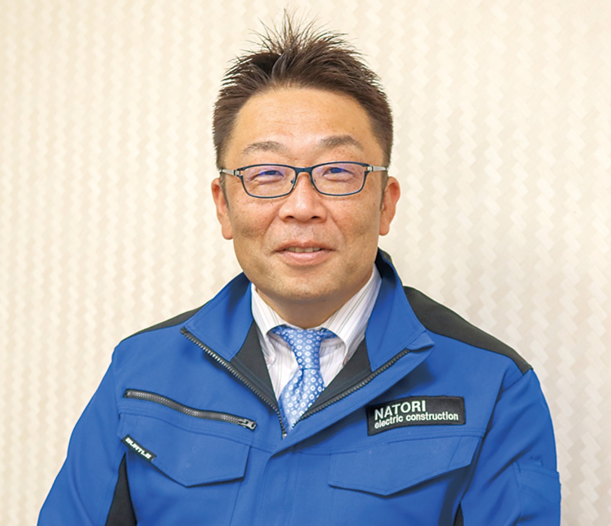 インタビューに答える名取社長