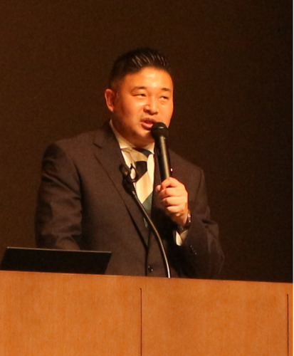 報告をする草間氏