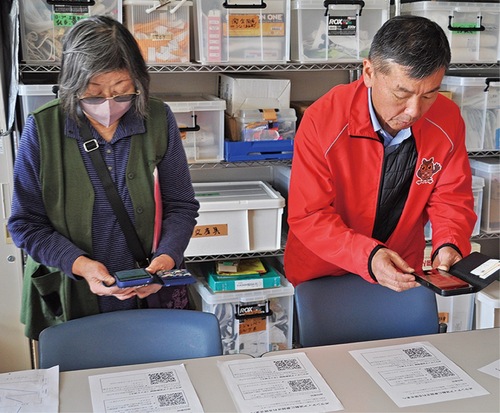 二次元コードを読み込み、当日の参加登録