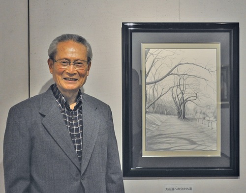 「大山道への分かれ道」と山崎さん