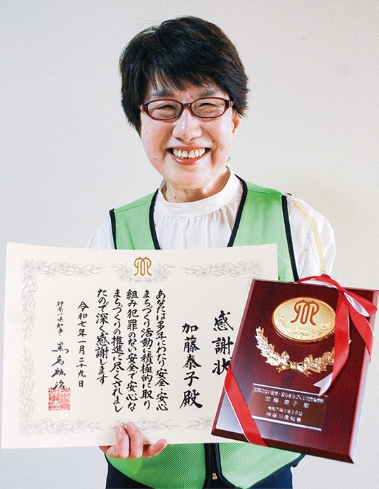 功労者表彰を受けた加藤さん