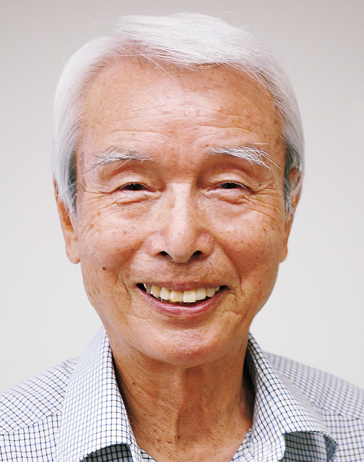 新出（しんで） 直美さん (写真1)