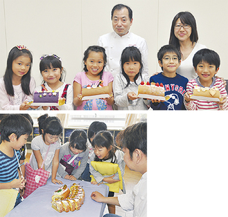 田浦社長（後列左）とケーキを手にする洋光台第四小の児童たち（写真上）完成したケーキについて高田オーナー（右）に質問する岡村小の児童たち（写真下）