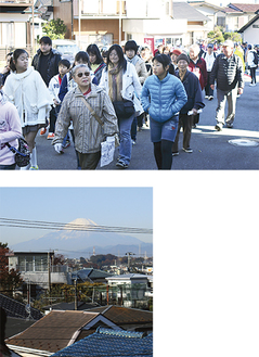 列になって地域を歩く参加者（上）、富士山もきれいに見えた