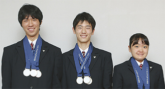 大会で健闘した（左から）陸上の田中君、松村君、水泳の木下さん