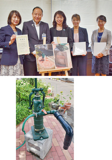 18日に区役所で行われた顕彰式（上）。立野小校内に設置された井戸