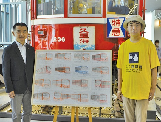 作品『アシタニネガイ　Hoping for Tomorrow』を寄贈した和田さん（右）と川俣社長