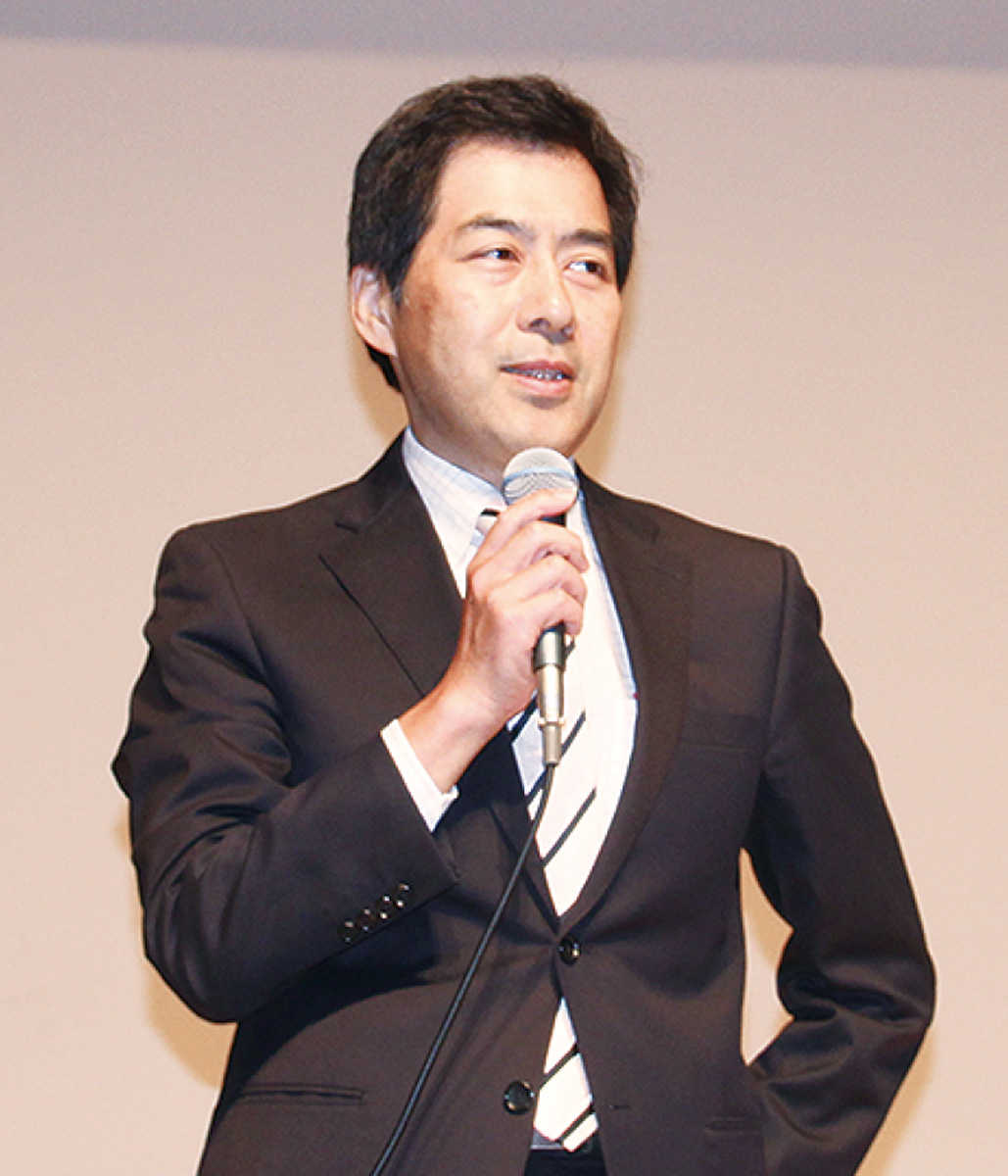 登壇する田上代表