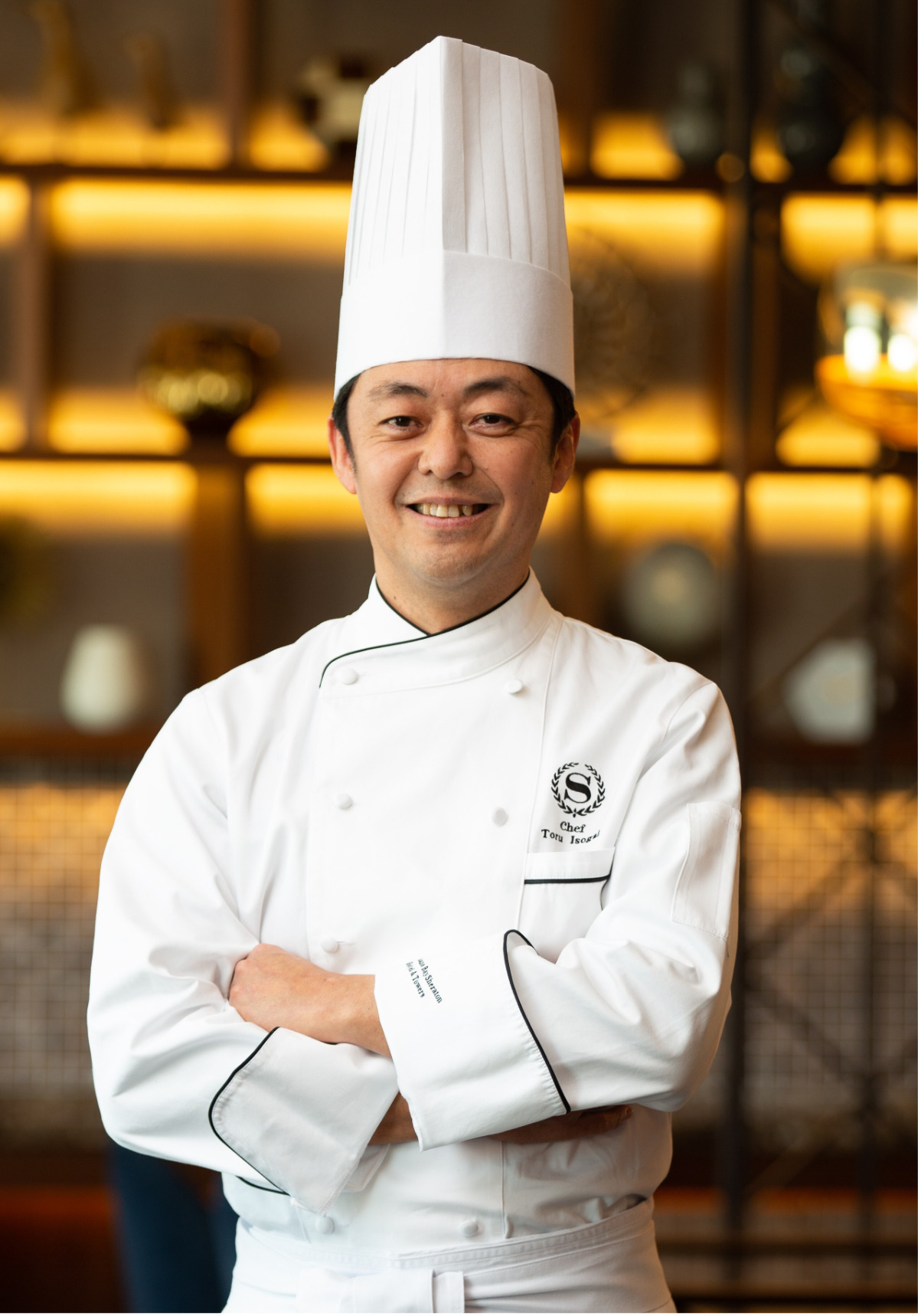 自身も３人の孫がいるという磯貝徹総料理長。総料理長監修の離乳食レッスンでは家庭でも再現しやすい「安心・安全でおいしい離乳食」のレシピを紹介する