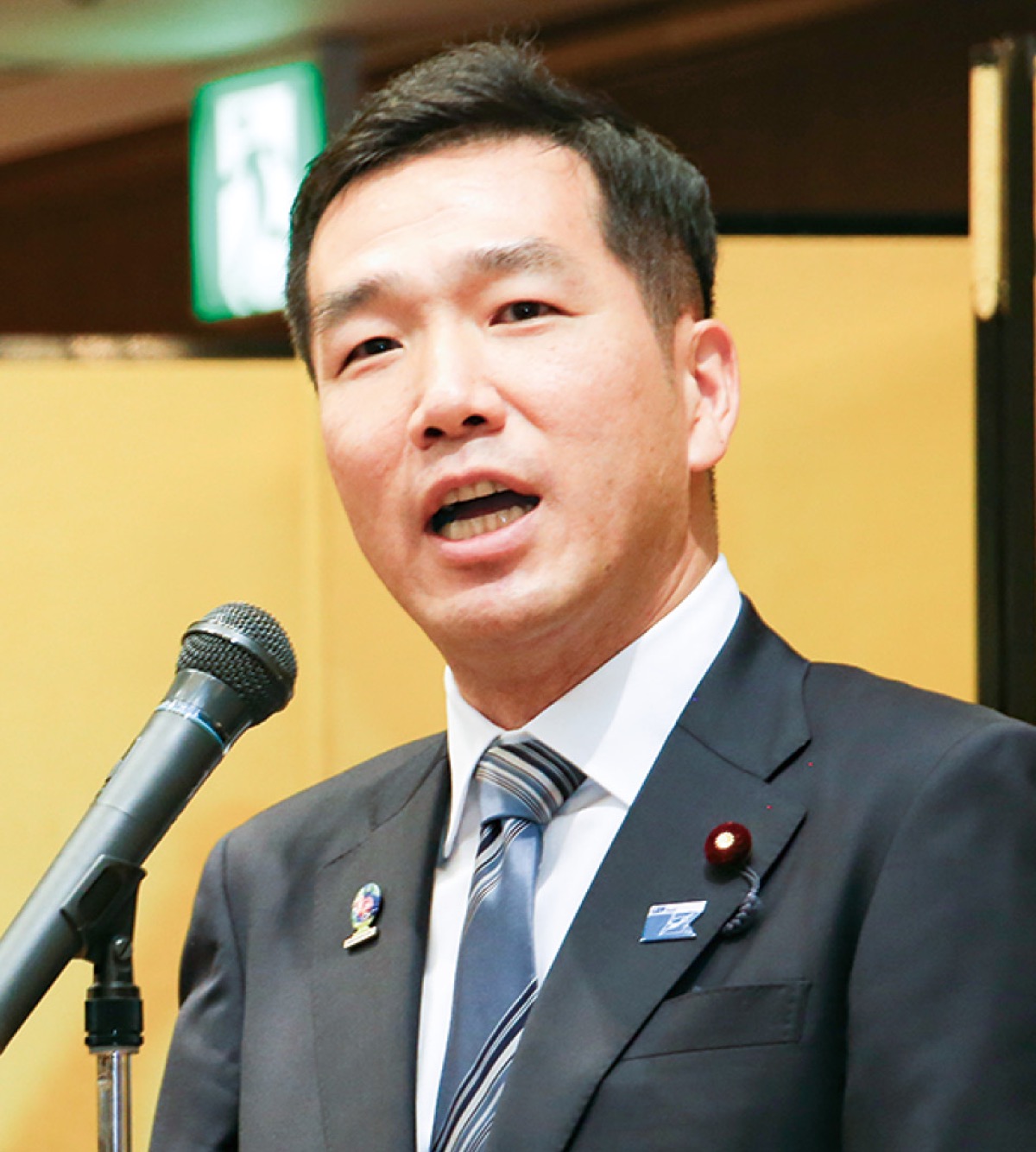 活動を報告する新田氏