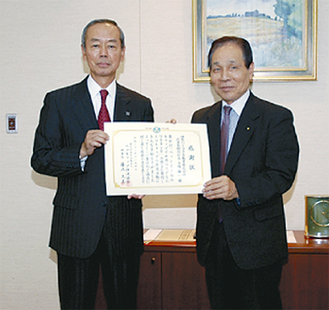 大塚社長（左）と永田事務局長