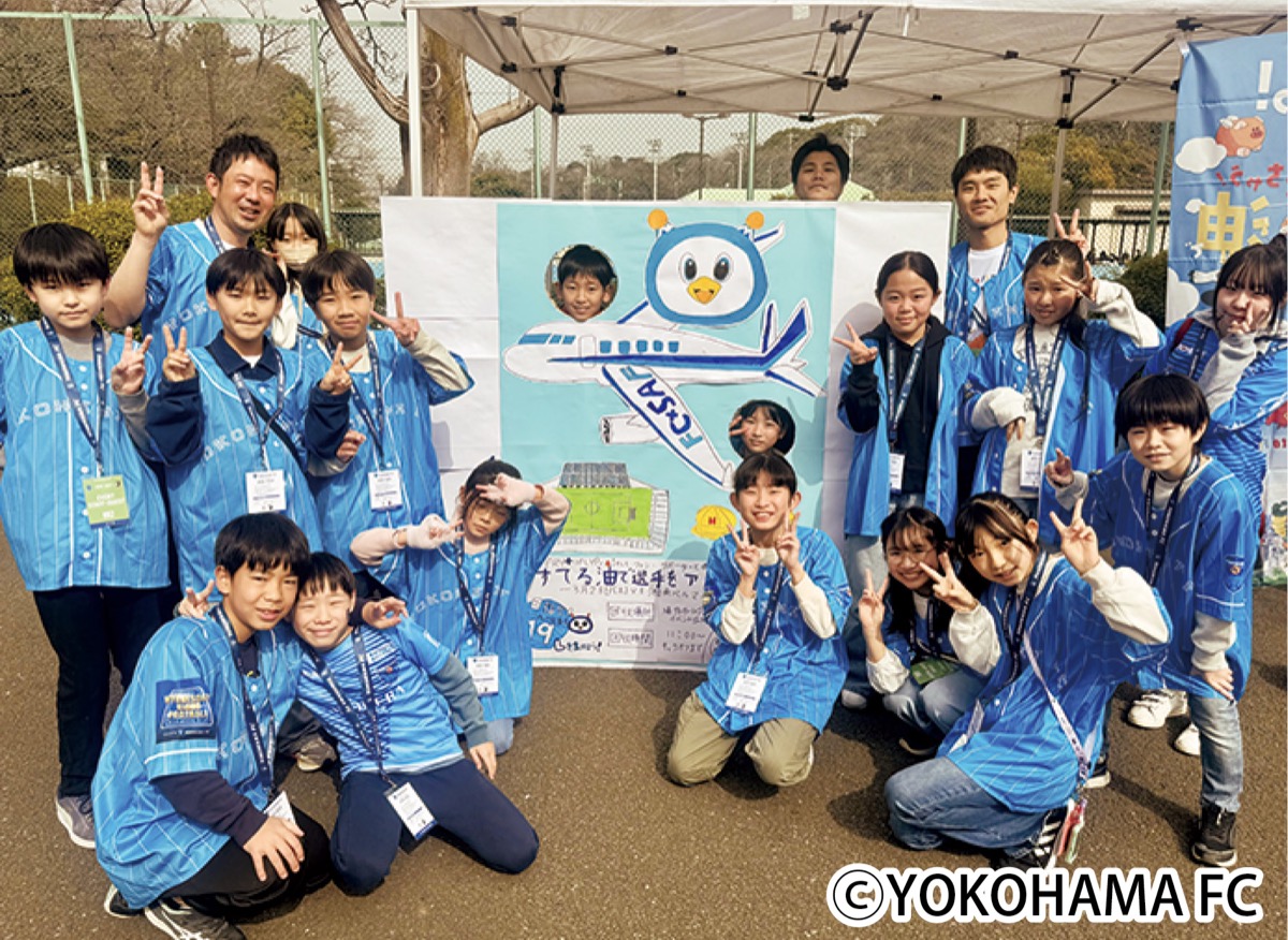 試合会場への持参を呼びかける西寺尾小の児童ら