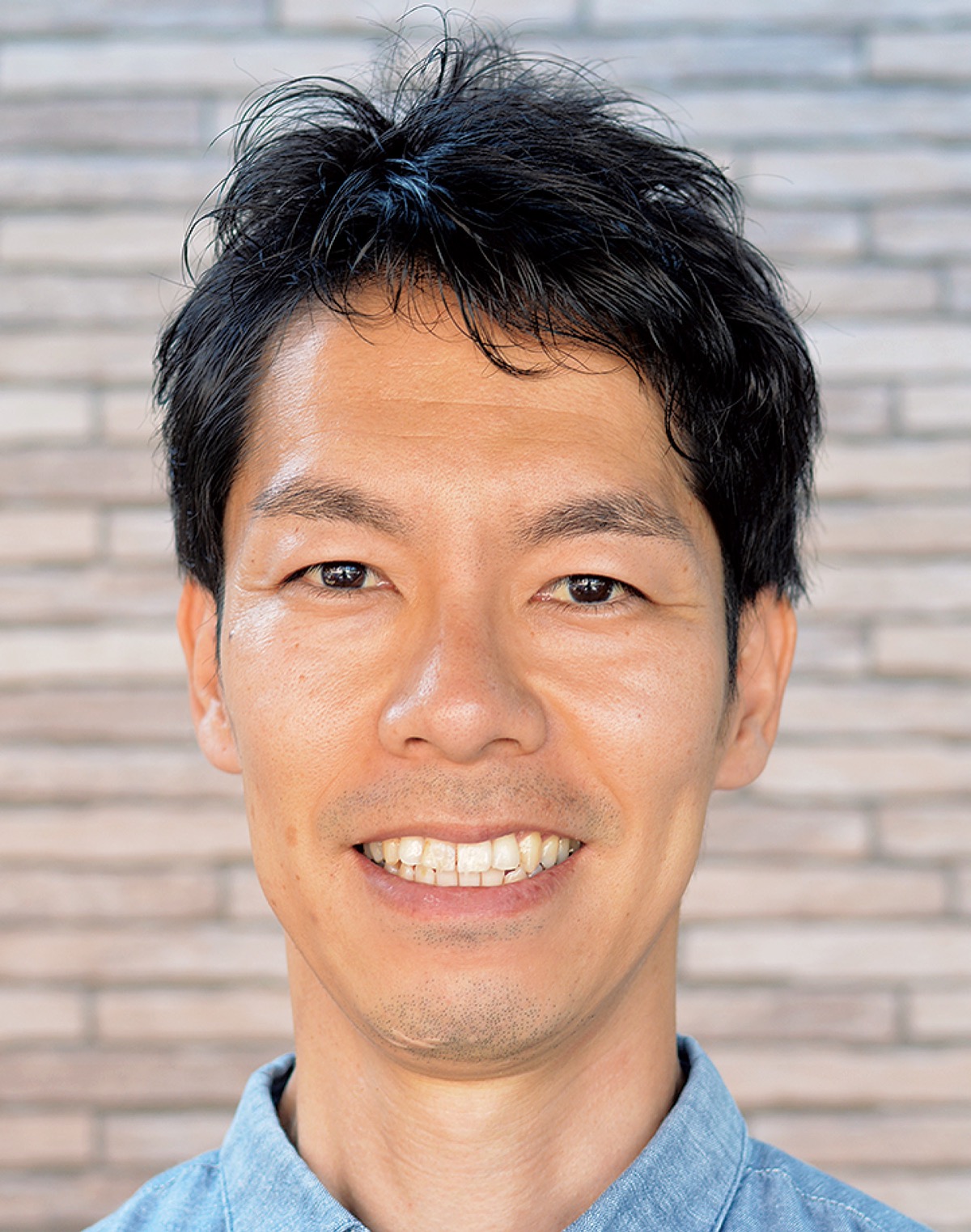 今岡 健太郎さん (写真1)