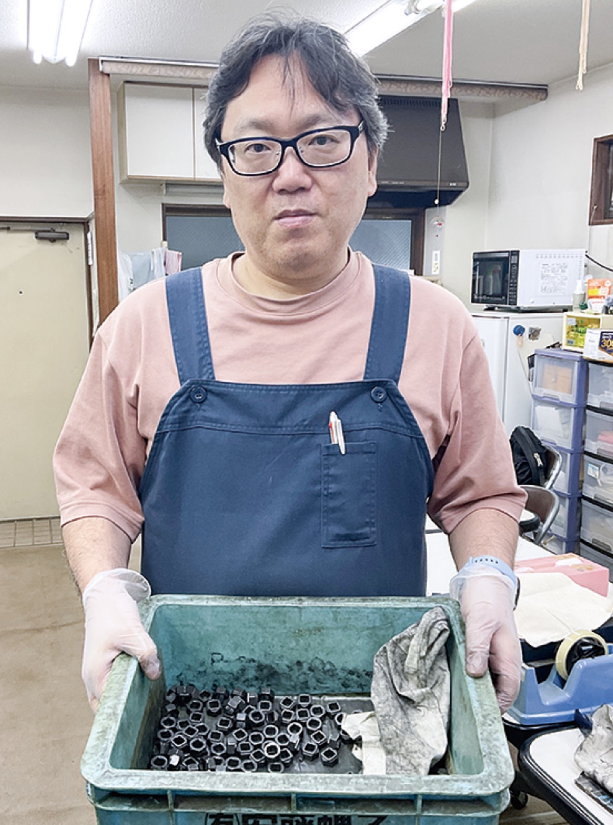 スタッフの三上聡さん