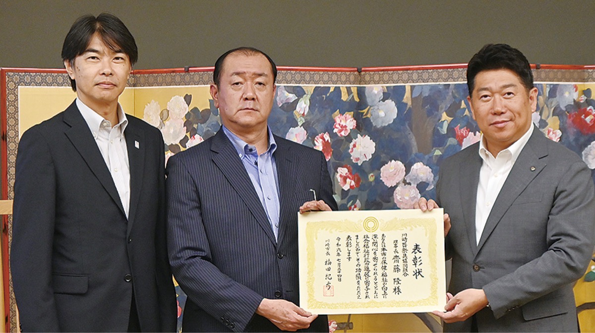 ロウソク提供で表彰