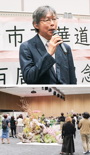 あいさつする徳安理事長（上）と会場の様子