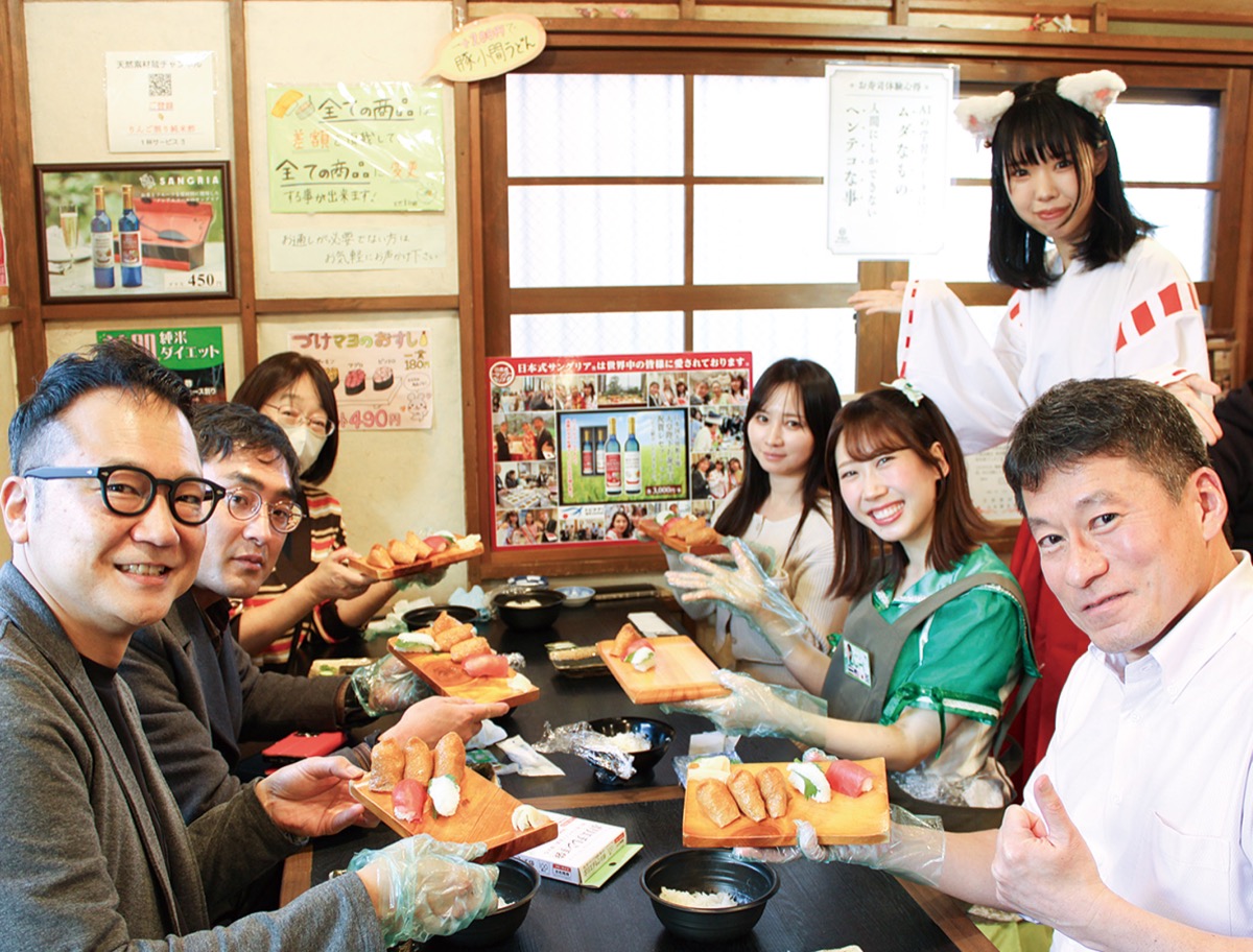 寿司を握り、絆深め