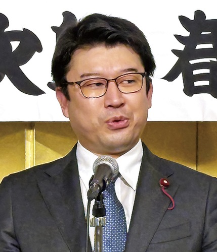 持論を述べる本間氏