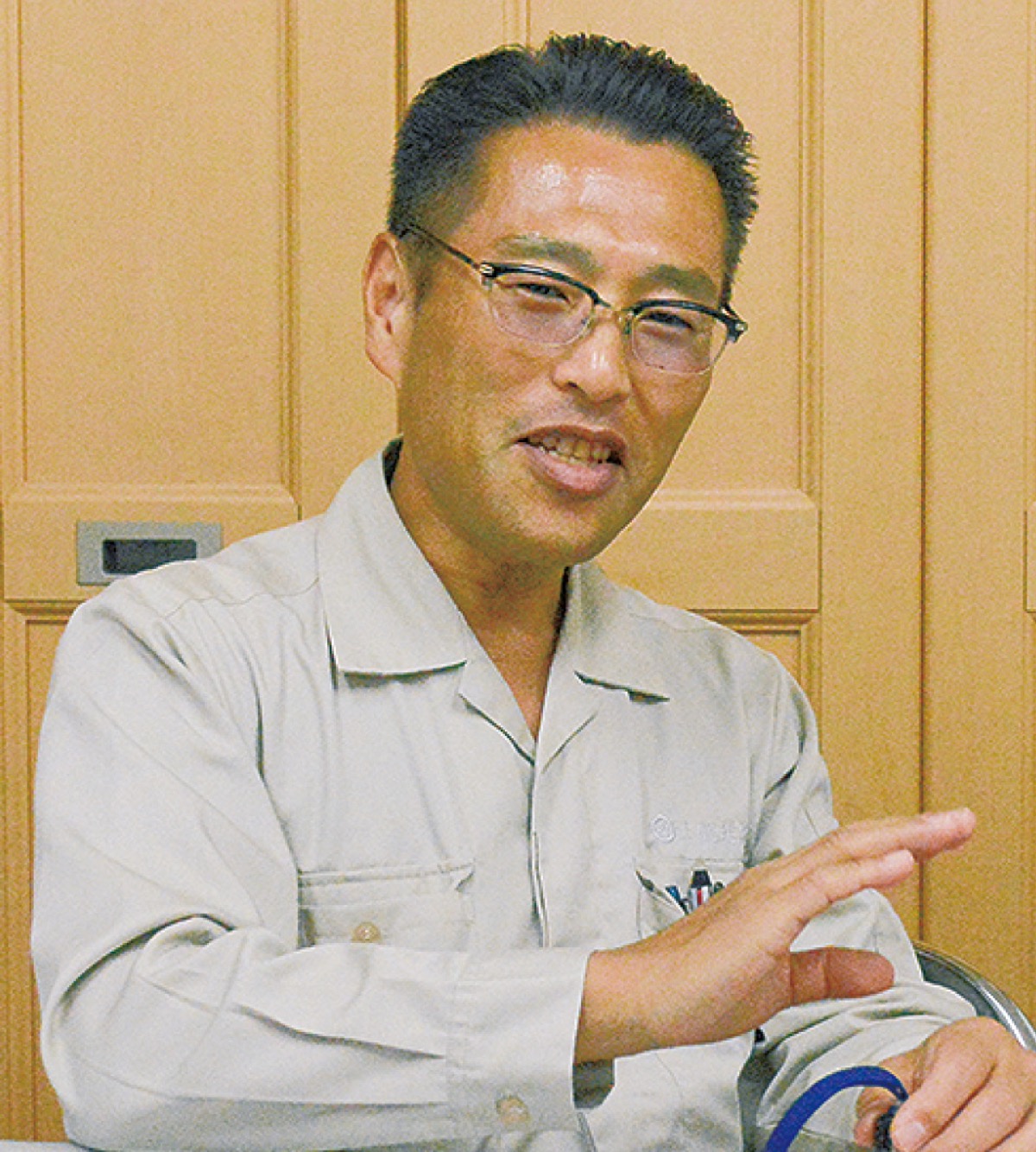 インタビューに応える加賀執行委員長