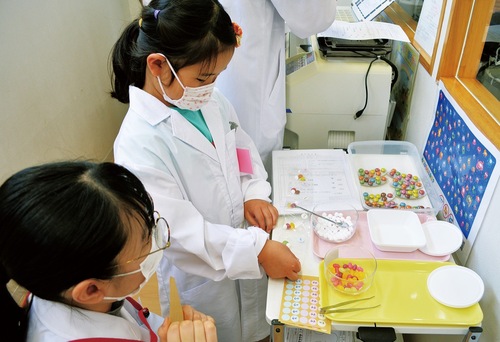 ｢一包化｣を体験する子ども