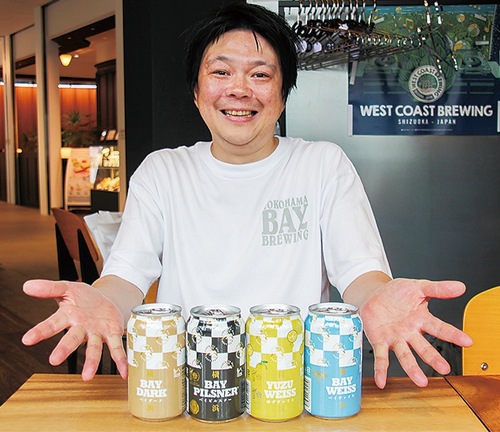 新発売の缶ビールと鈴木代表