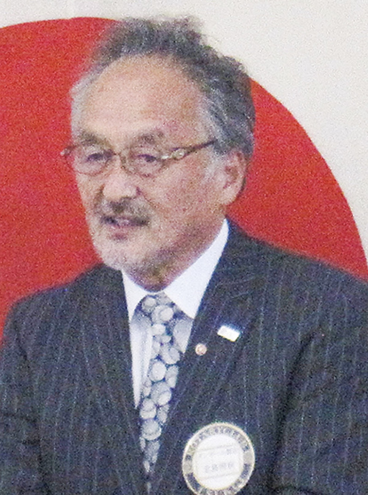 最後の例会で挨拶する北島会長