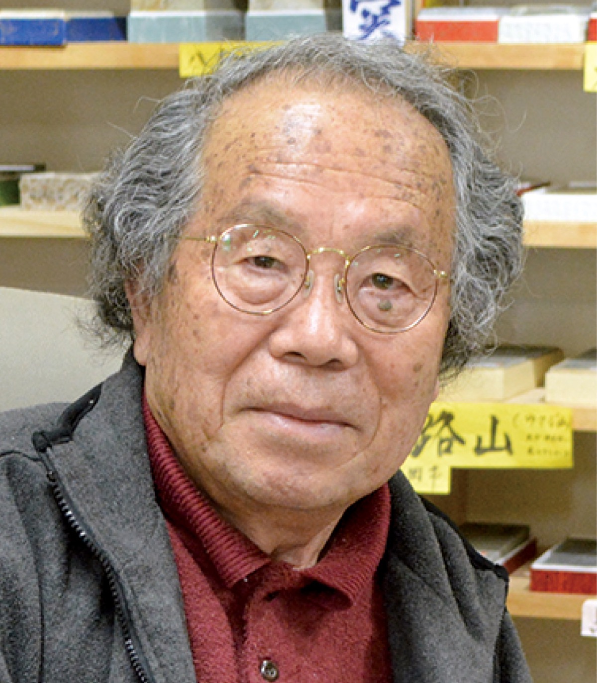 取材に応じる佃さん