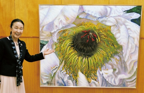 お気に入りの一枚を紹介する竹内さん