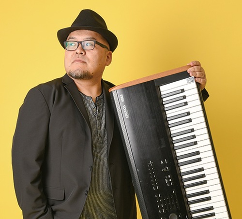 池田聡さん、爆風スランプ、諸星和己さんらをサポートしているジミーさん＝本人提供