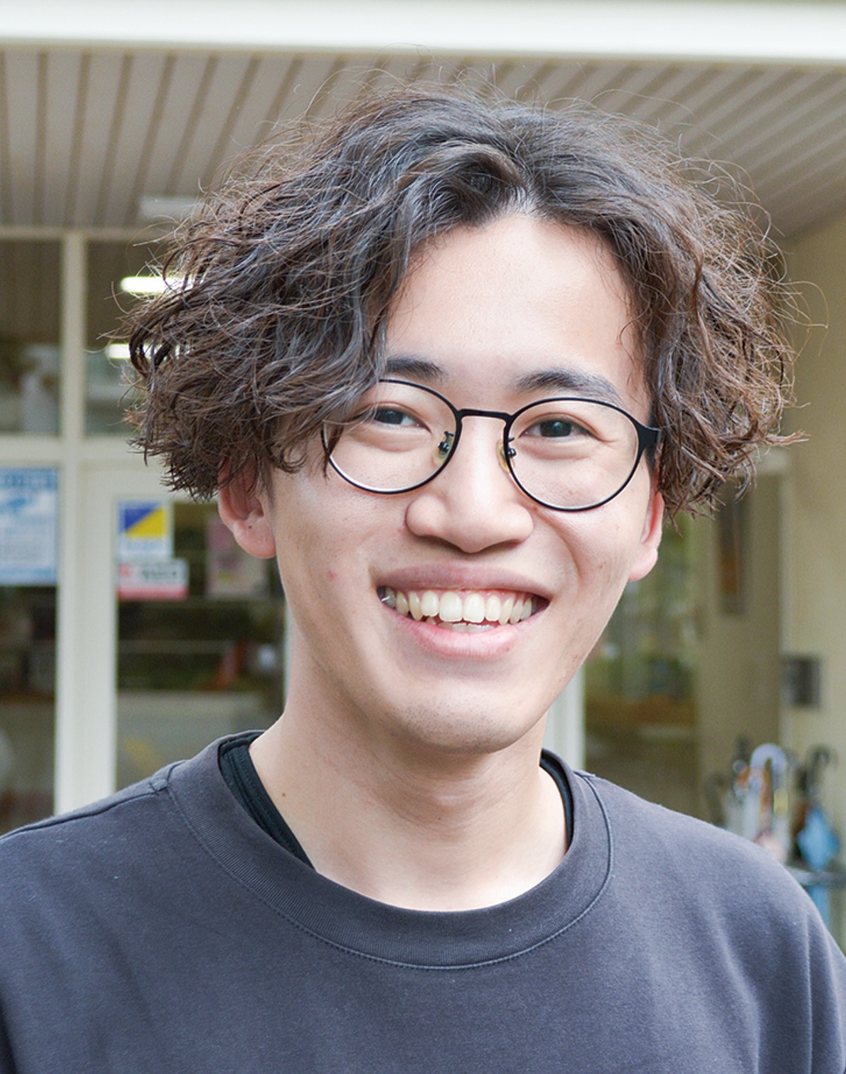 岡崎 将哲（まさる）さん (写真1)