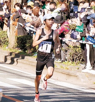 ▲福岡の町を力走する吉田選手