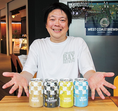 新発売の缶ビールと鈴木代表