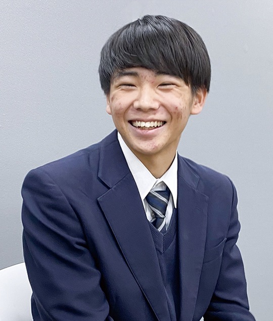 取材に答える村山さん