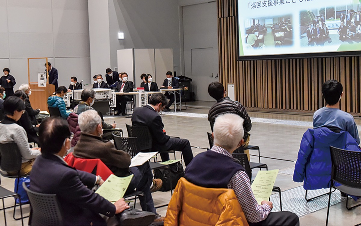 報告会に90人超