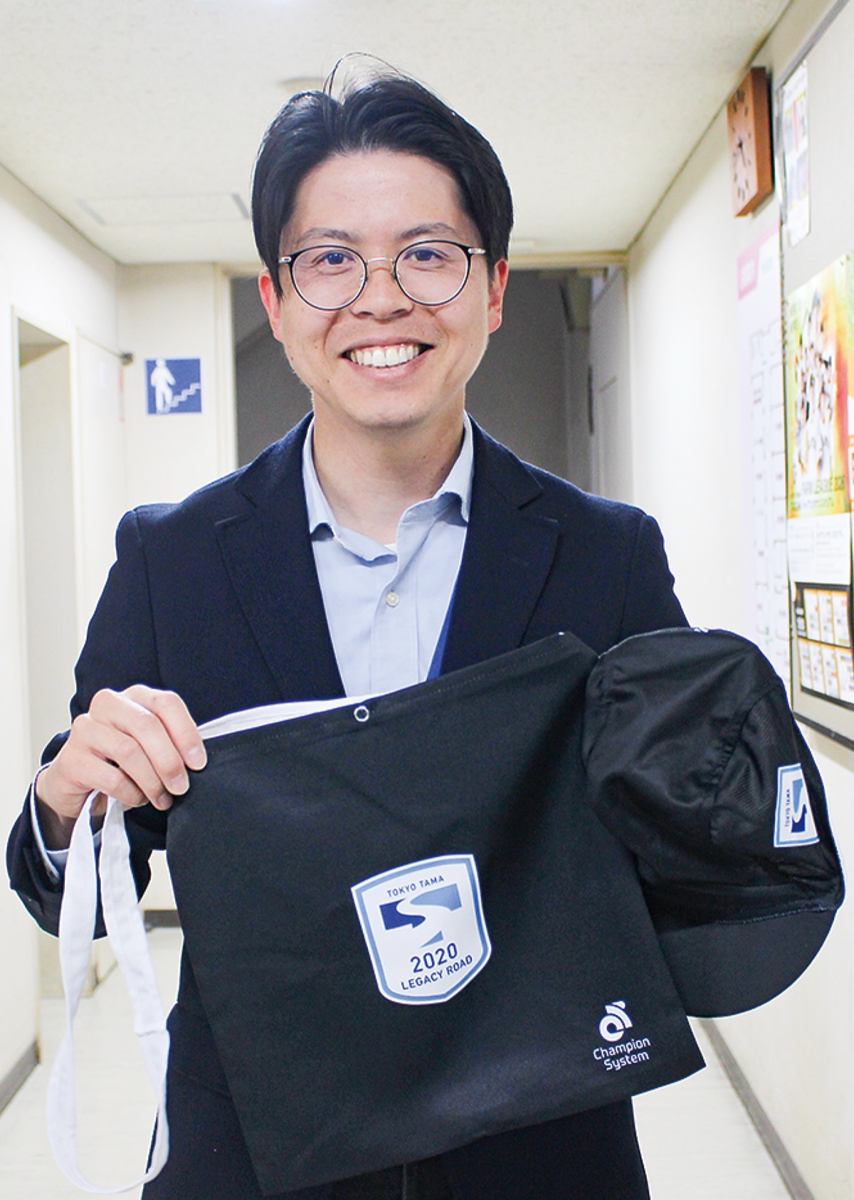 8市の取組みを紹介する稲城市の加藤さん