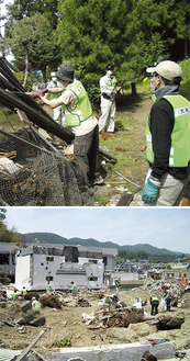 陸前高田市内でがれきや木材などを撤去する大和市の新採用職員