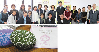 ４月に会津若松市を訪問し現地の人と意見交換（上）、手づくりのブローチ（左）