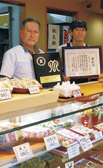 小嶋孝榮さん（左）と隆さん