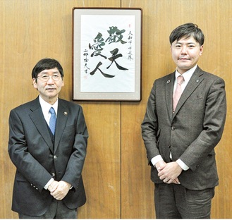 大木市長（左）と屋比久理事長（右）