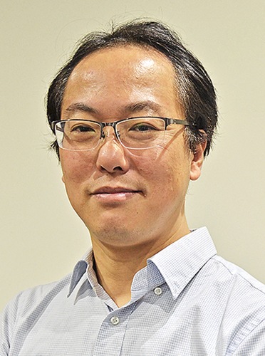 講演を行う津田さん