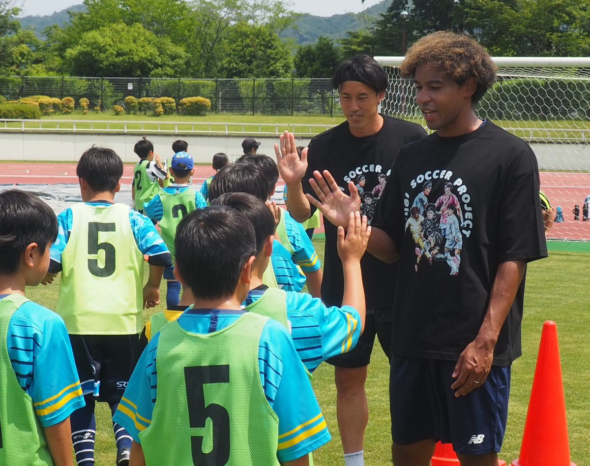 練習後にはハイタッチ