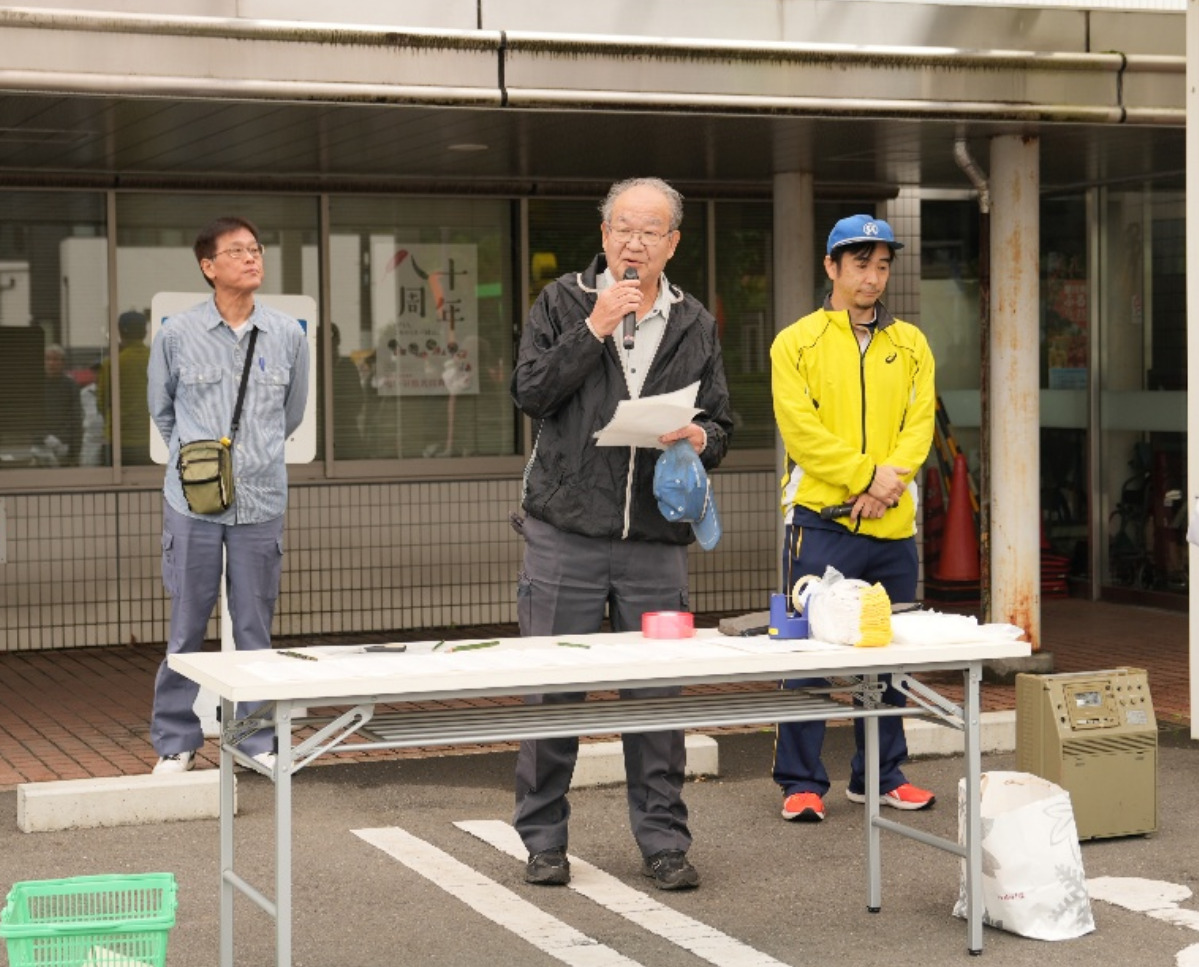 挨拶する村上副理事長