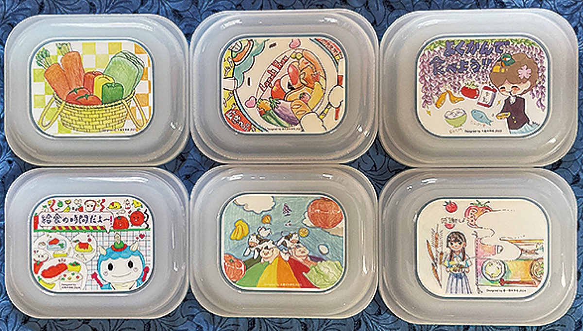 中学生が描いたイラストがあしらわれた給食用ランチボックスのフタ