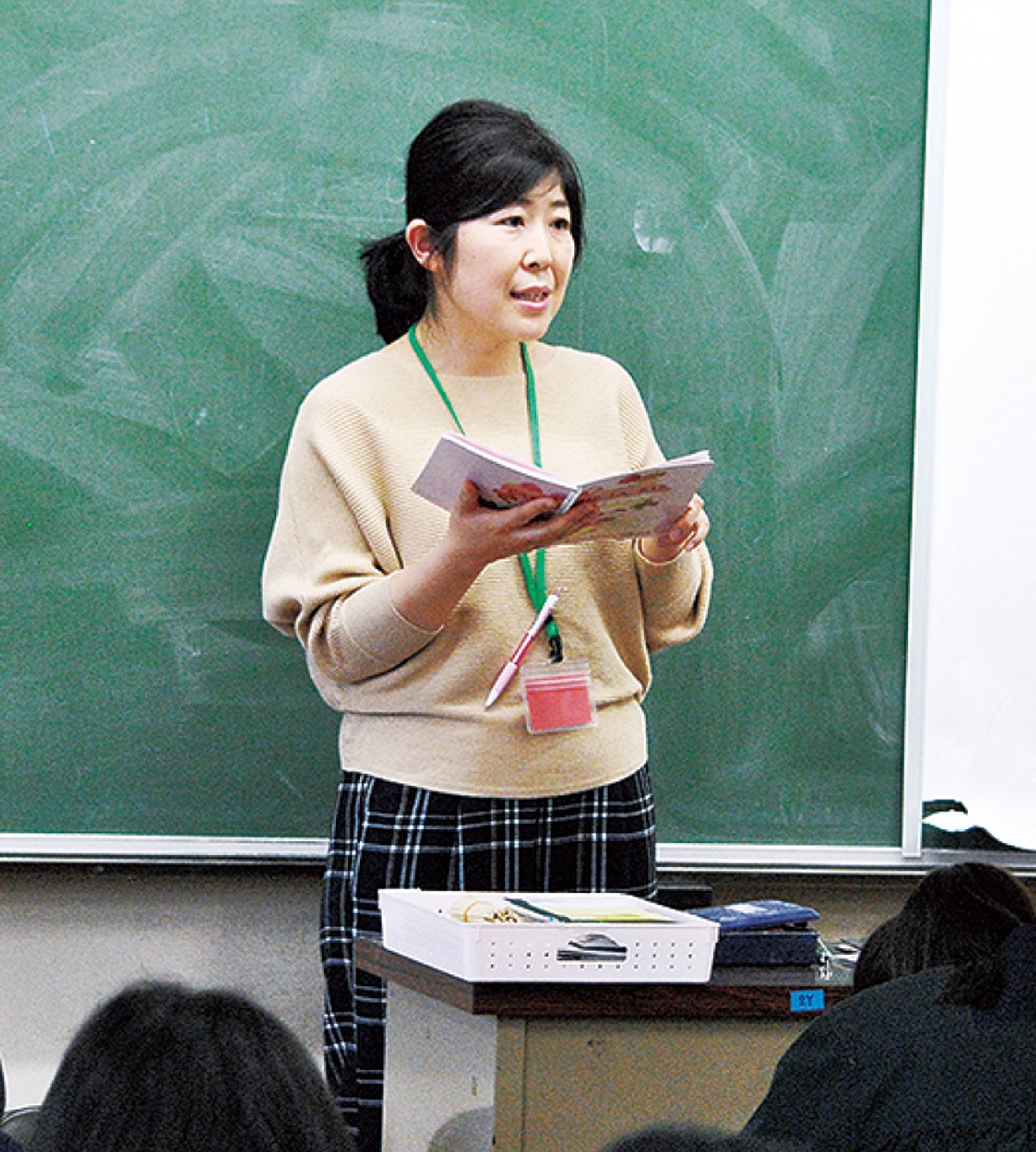 講演する堀内さん
