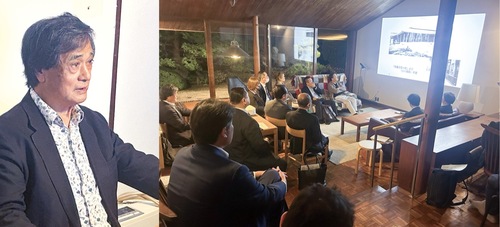 山口会長(左)の講演に聞き入る参加者